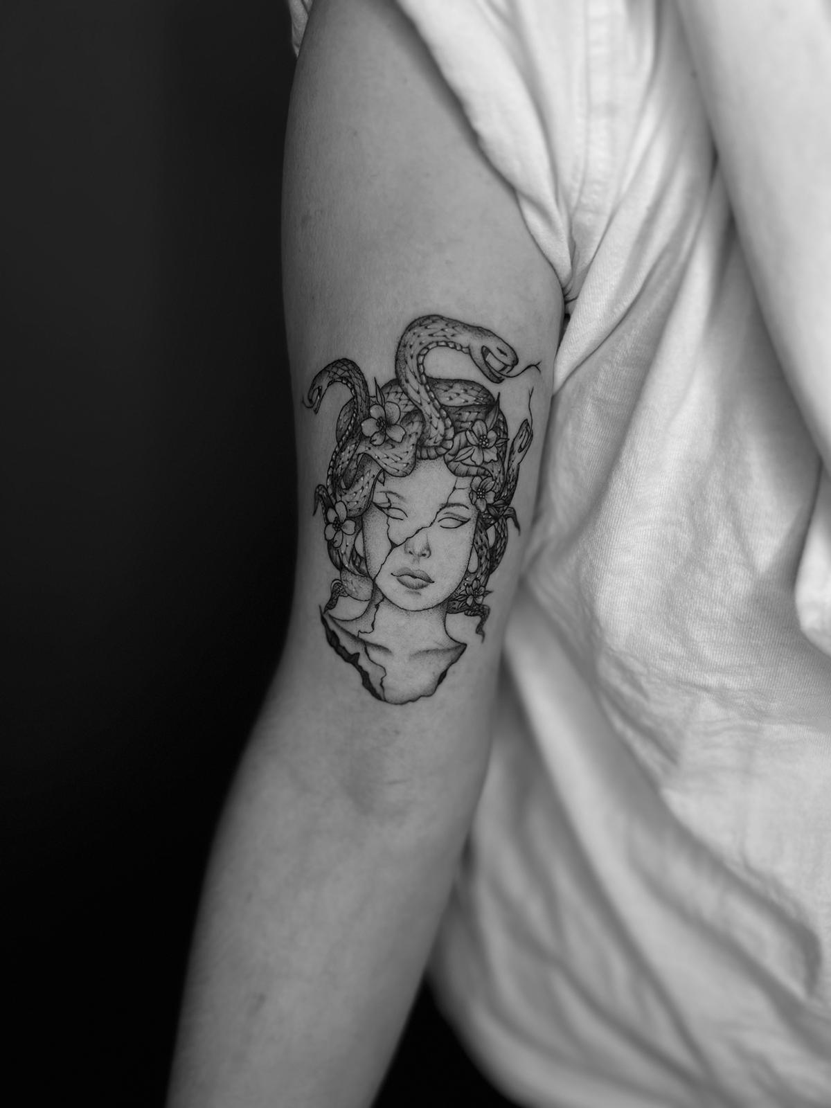 arm tattoo medusa