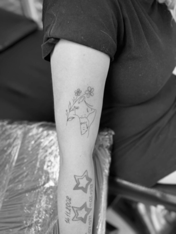 Tattoo baby mother flowers